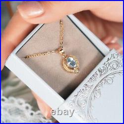 Natural Blue Topaz and Diamond Vintage Style Pendant in solid 9K Yellow Gold